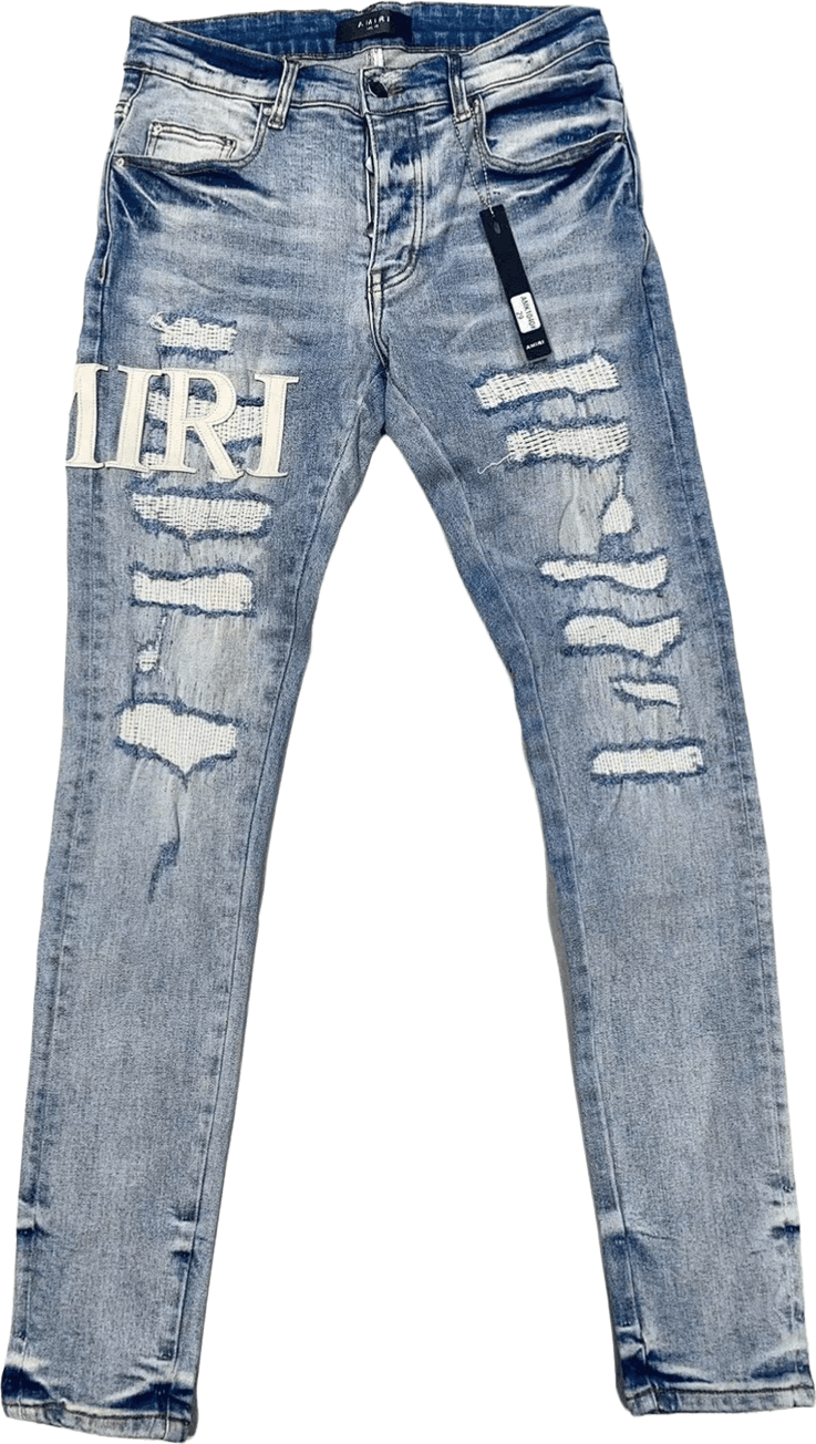 Pantalon jean Amiri distressed bleu clair avec détails textiles